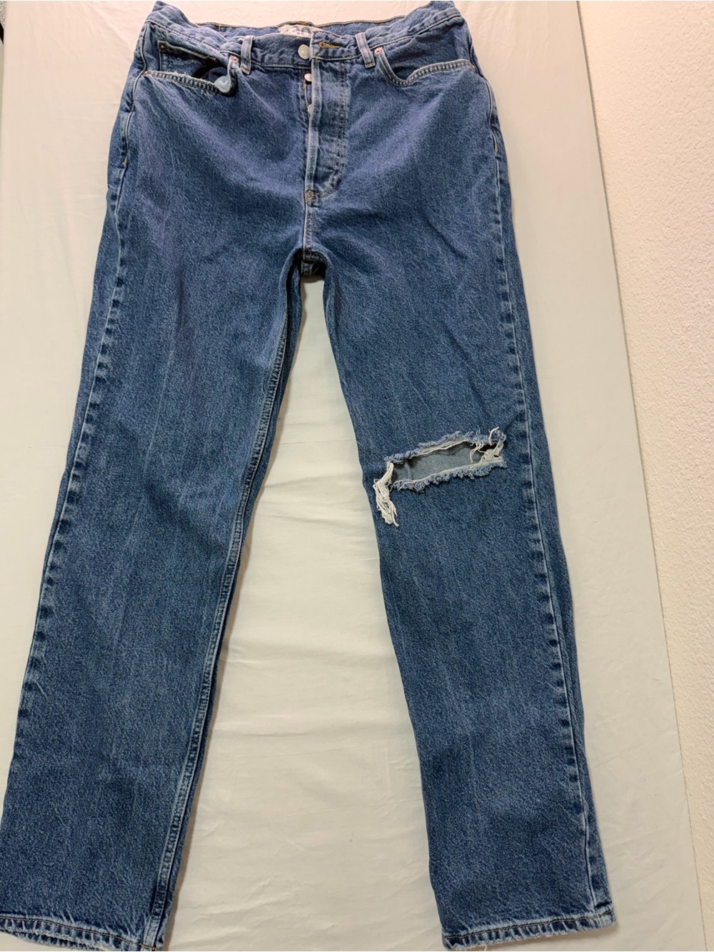 We The Free Straight Leg Jeans in Blue with Distressed Knee Rip